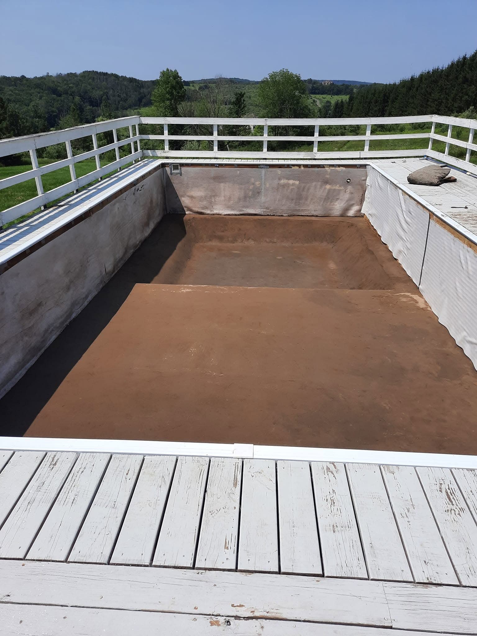 Regraded pool base prepped for the new liner